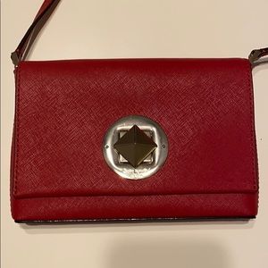 Small Red Kate Spade crossbody handbag